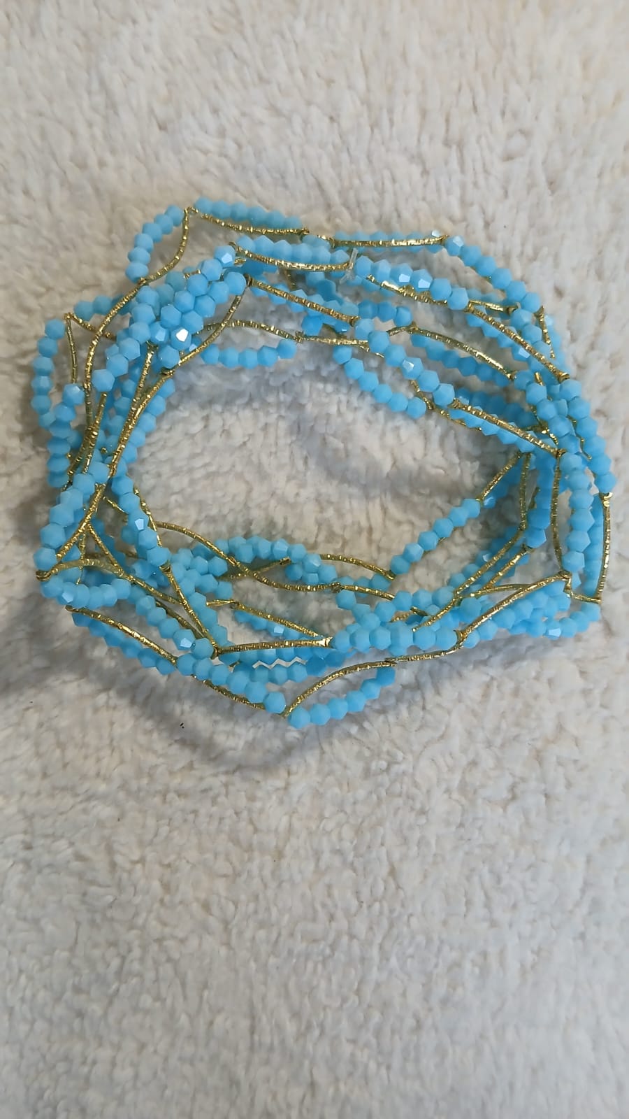 Baya, Bine Bine, Perles de reins, Cristal